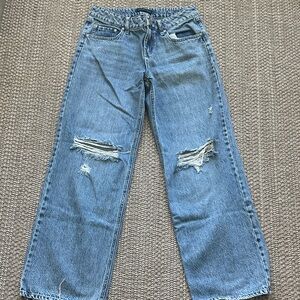 Distressed Blue Jeans